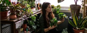 a woman with her plants