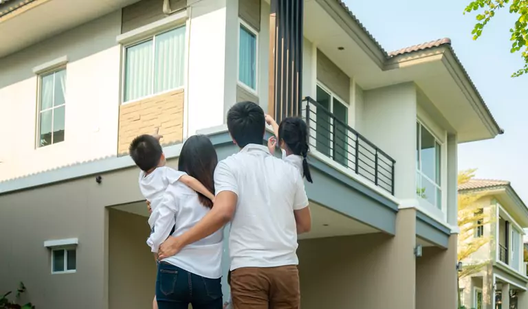 Family inspecting a property before owning it