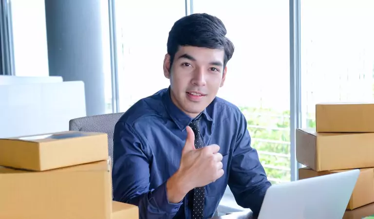 young man showing thumbs up