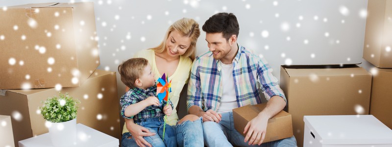 young family preparing for a household relocation during the christmas