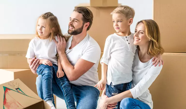 family inside of a new house