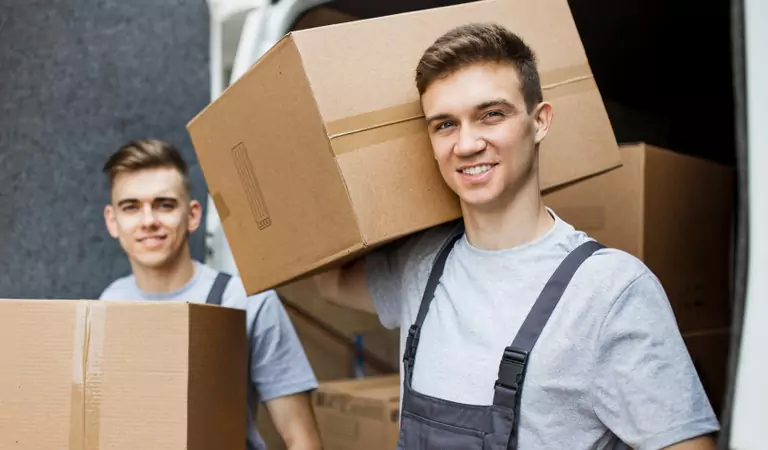 young professionals with cardboard boxes